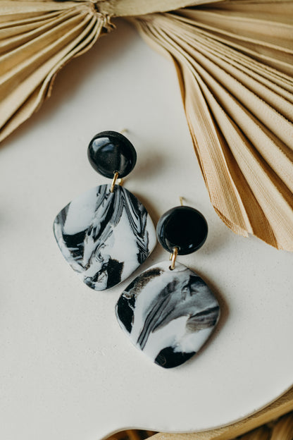 black polymer clay earrings with white pattern