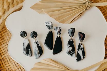 black polymer clay earrings with white pattern