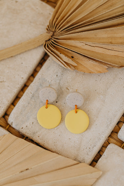 two-tone round polymer clay earrings in bright colors