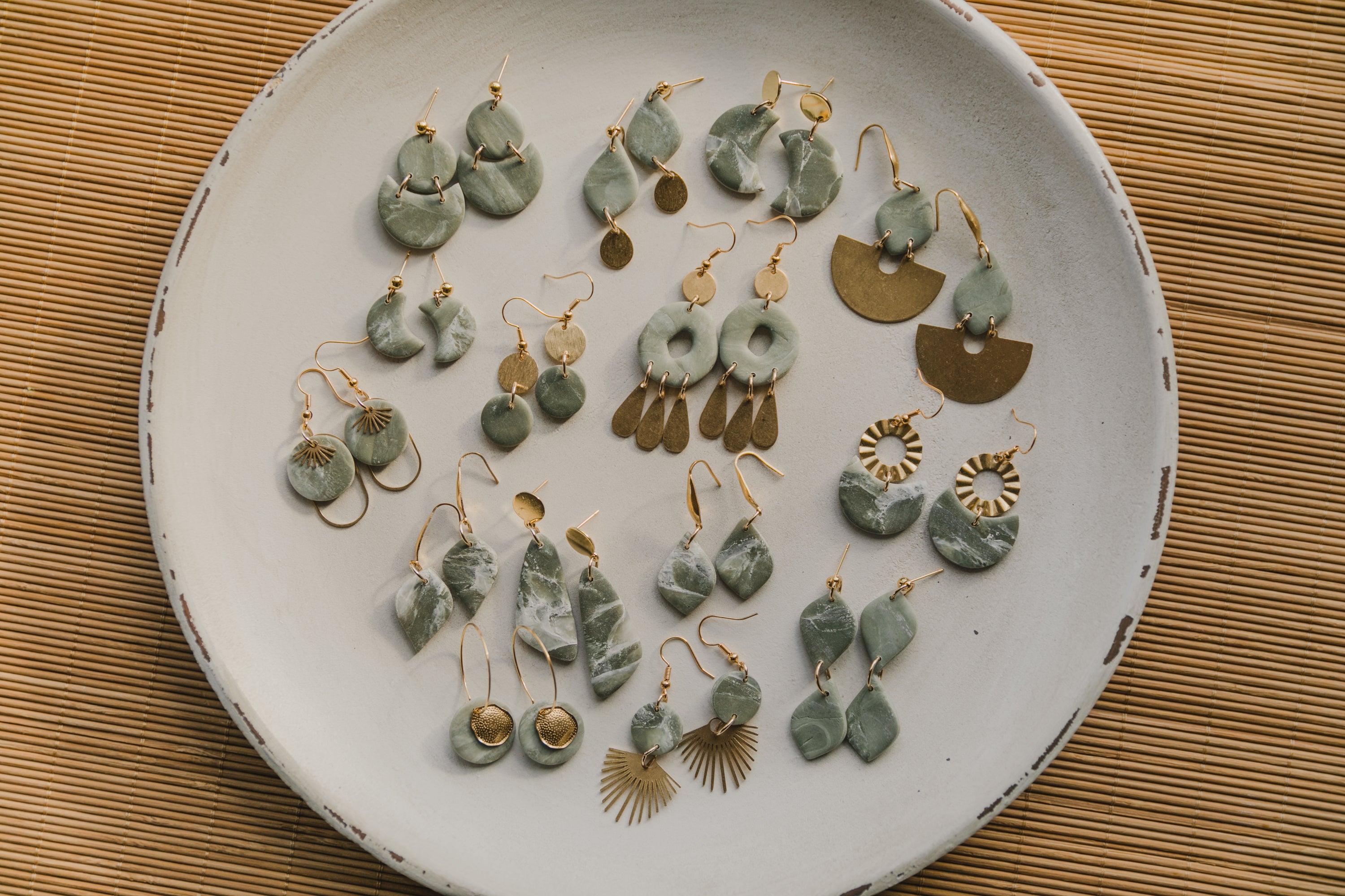 Hoop earrings with round polymer clay pendant and leaf