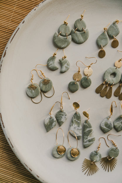 Hoop earrings with round polymer clay pendant and leaf