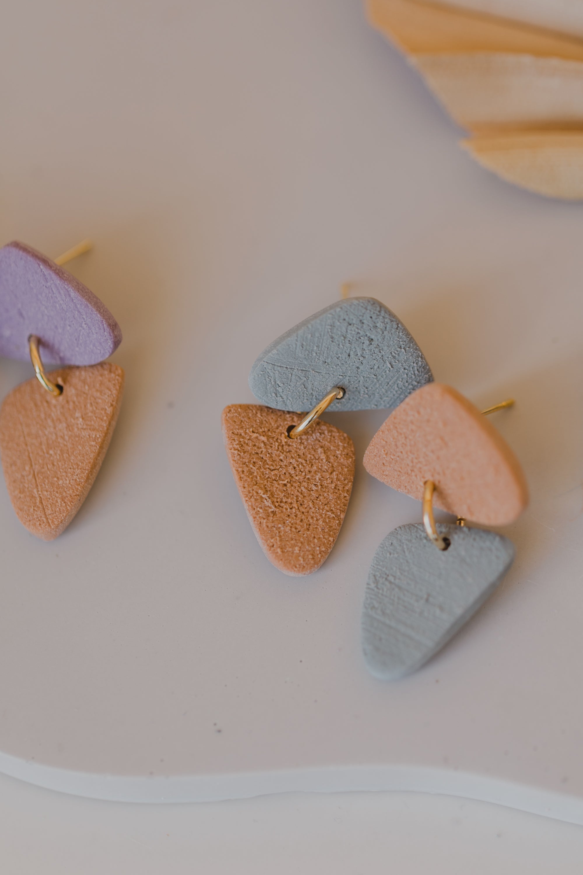 round earrings made of polymer clay in autumn colors