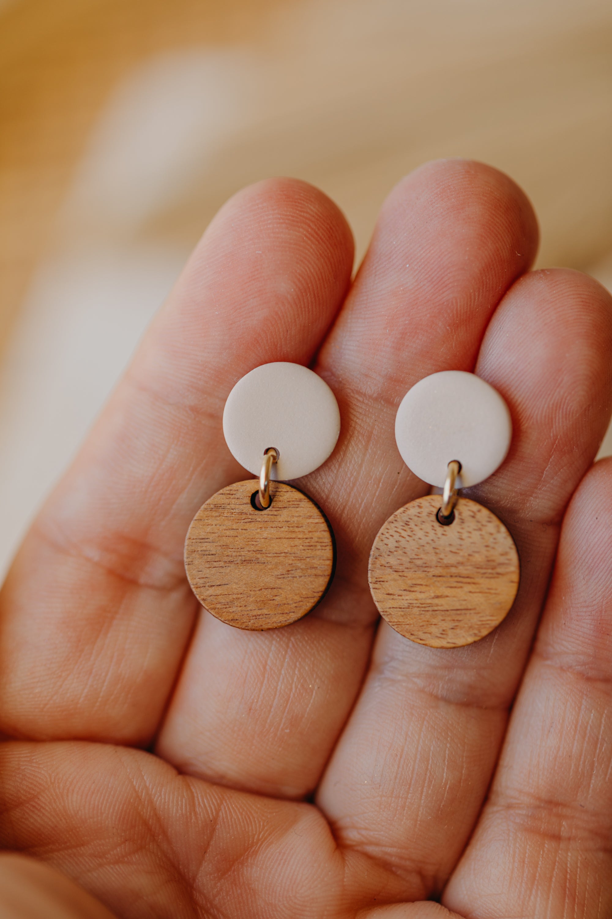 round beige polymer clay earrings with round wooden pendant