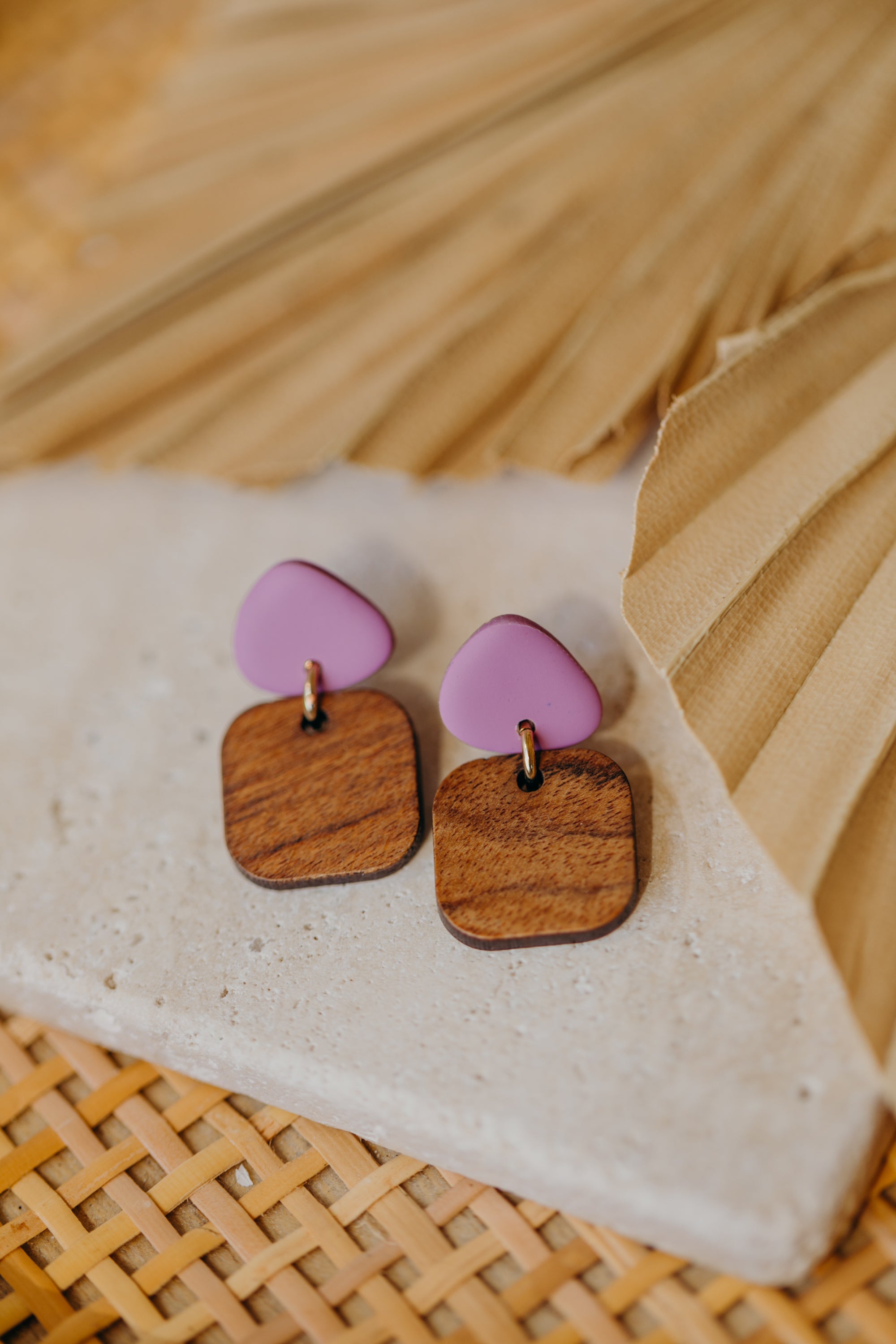 triangular polymer clay earrings in fuchsia with rectangular wooden pendant