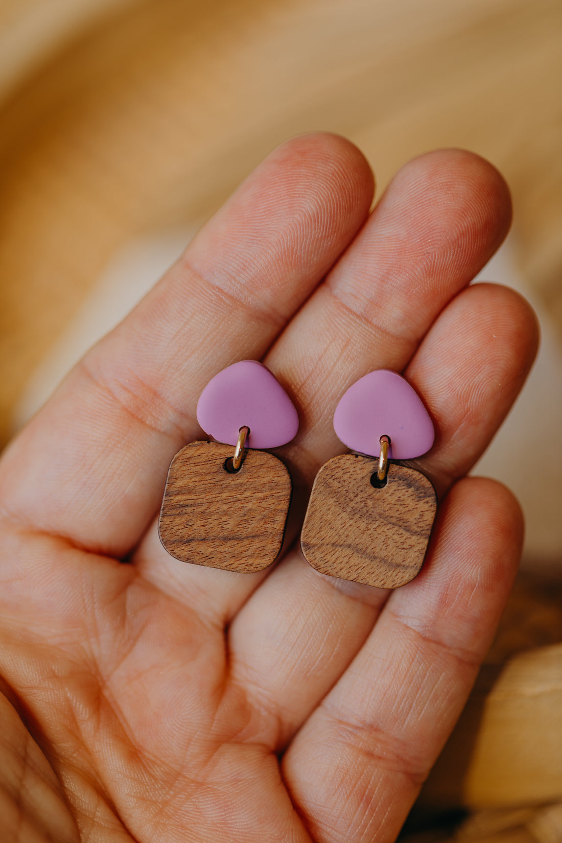 triangular polymer clay earrings in fuchsia with rectangular wooden pendant