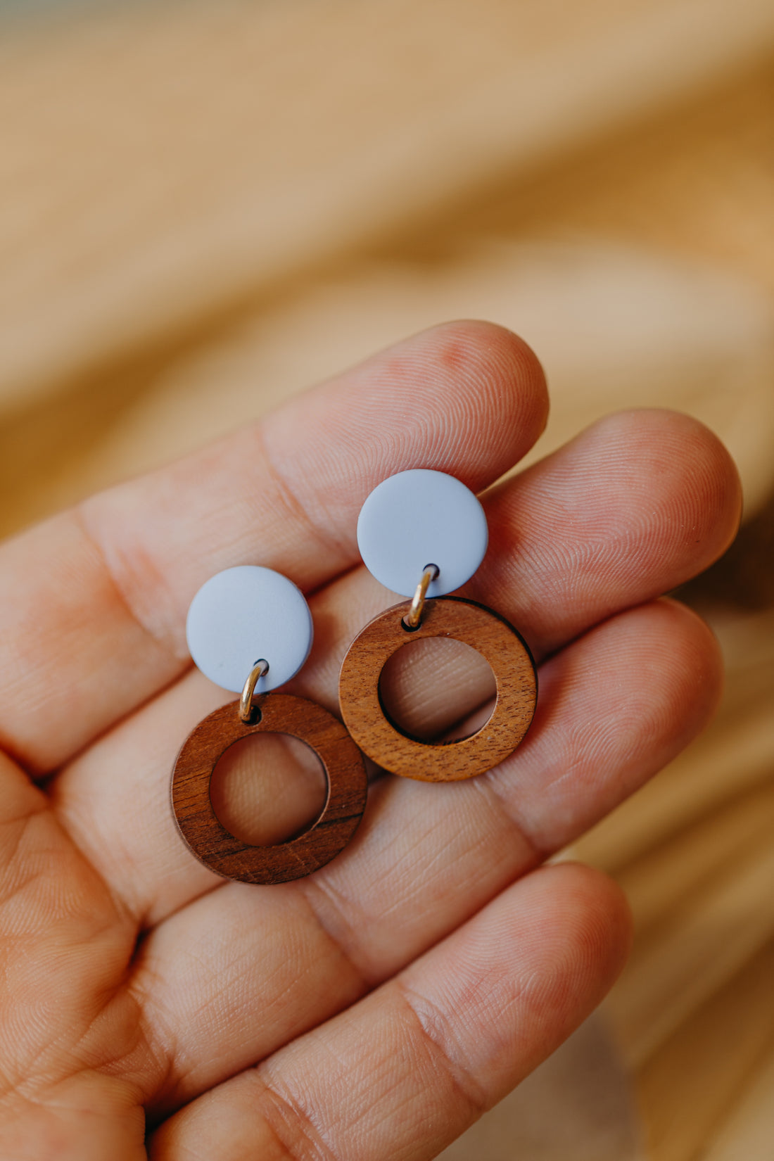 round polymer clay earrings in pastel blue with wooden pendant small circle