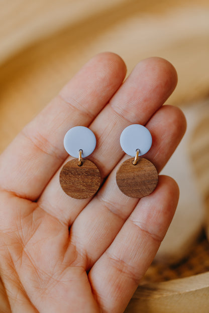 round pastel blue polymer clay earrings with round wooden pendant