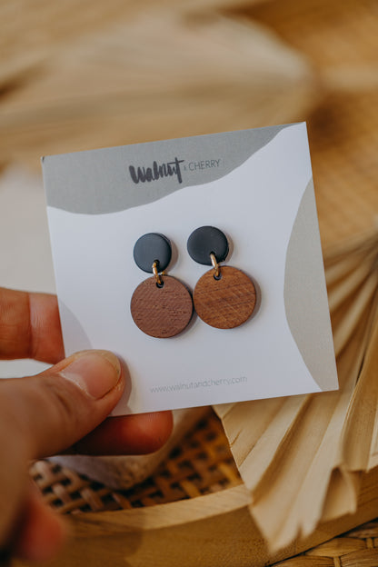 round black polymer clay earrings with round wooden pendant