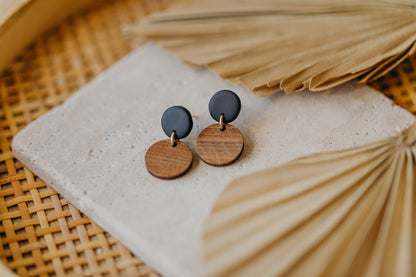 round black polymer clay earrings with round wooden pendant