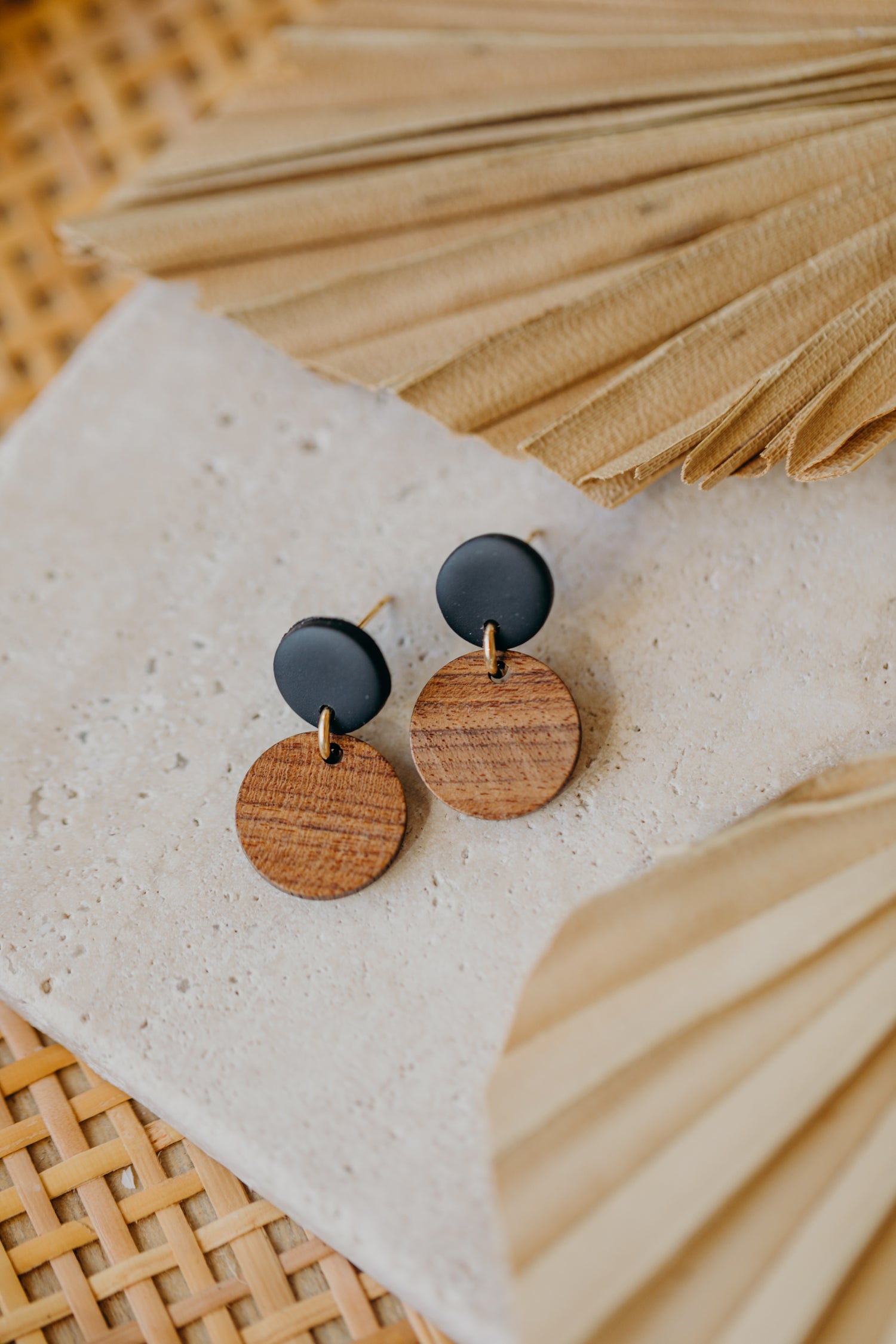 round black polymer clay earrings with round wooden pendant