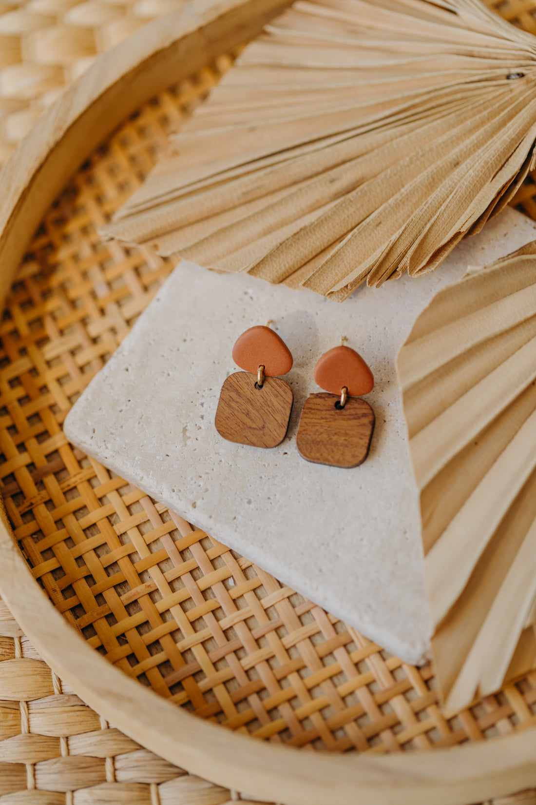 triangular polymer clay earrings in cinnamon with rectangular wooden pendant