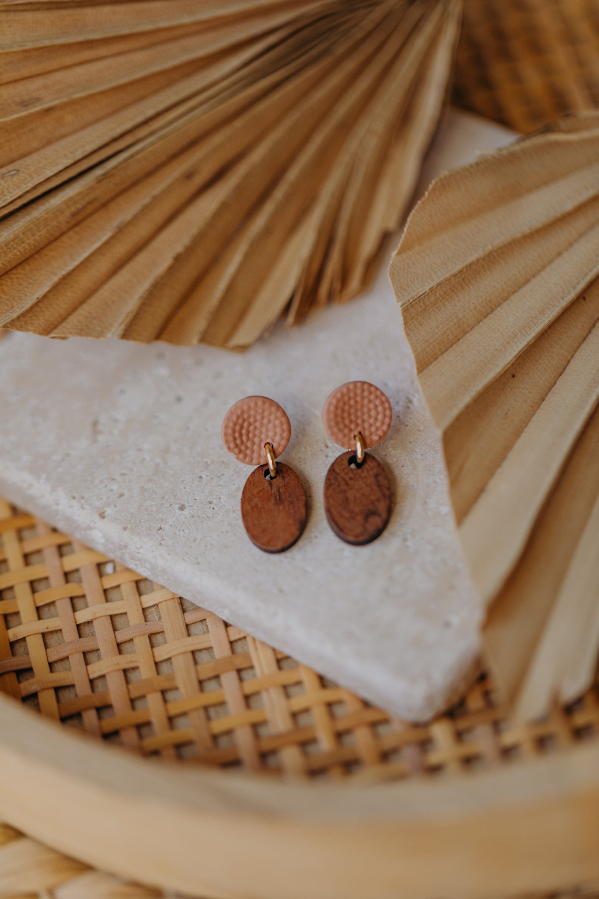 round polymer clay earrings in tangerine with oval wooden pendant