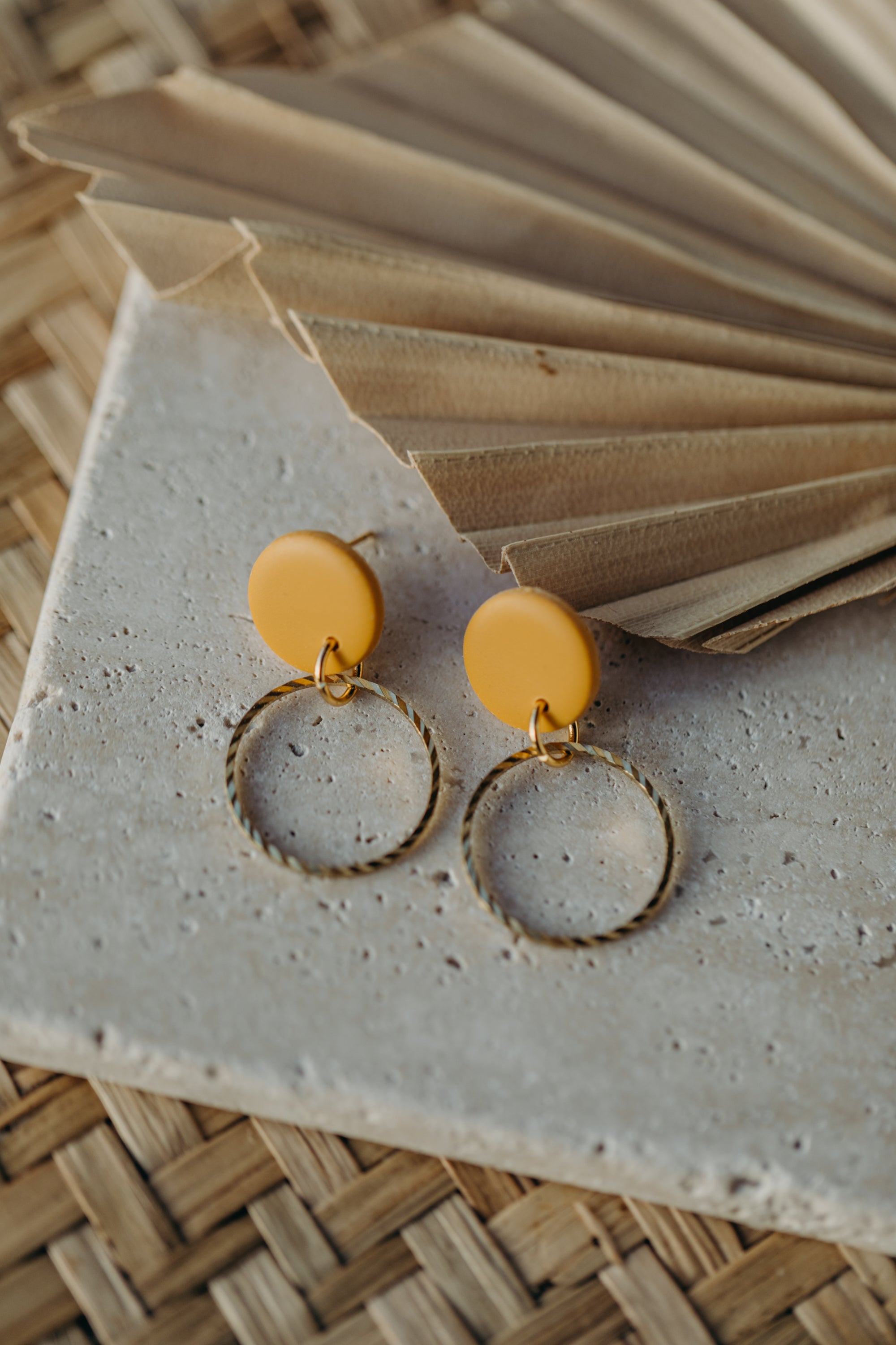 round polymer clay earrings with brass pendant circle