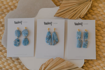 Hoop earrings with round polymer clay pendant and leaf