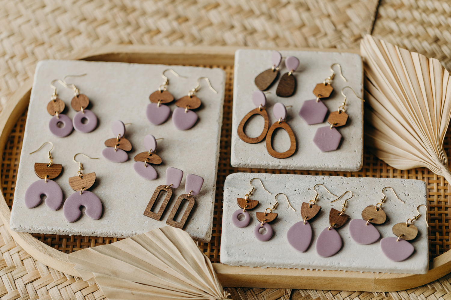 triangular polymer clay earrings in eucalyptus green with rectangular wooden pendant