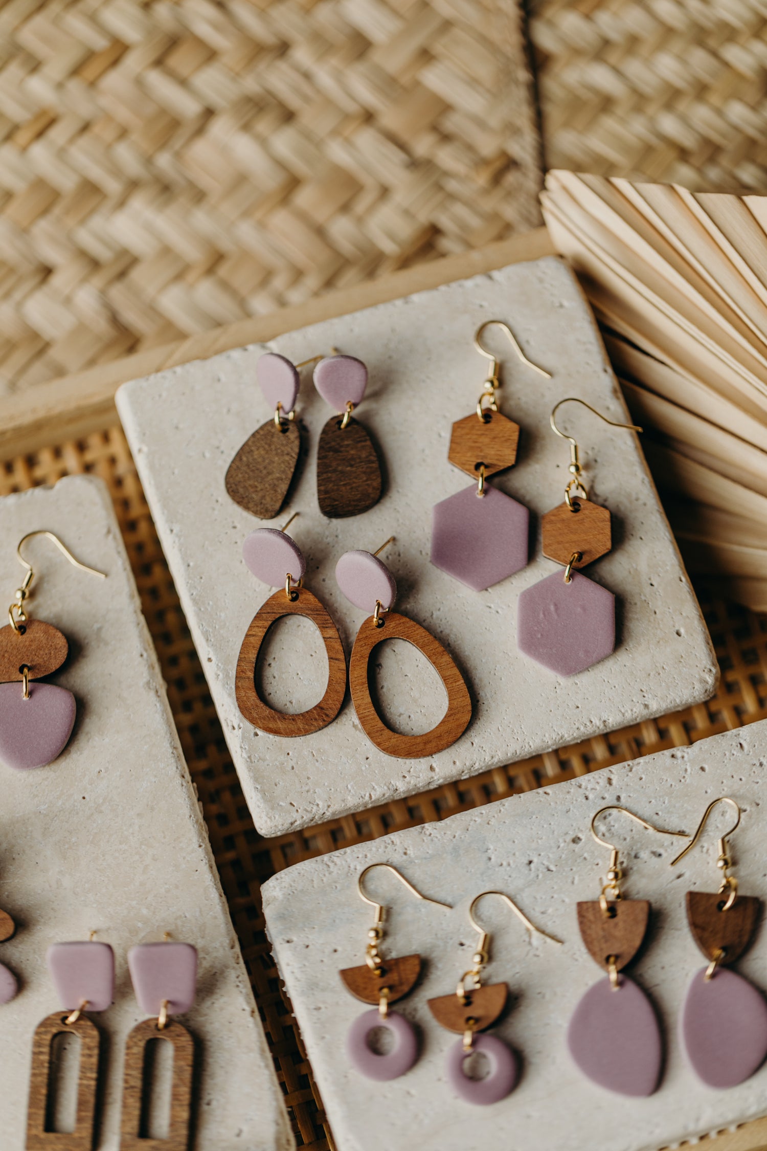 triangular polymer clay earrings in eucalyptus green with rectangular wooden pendant