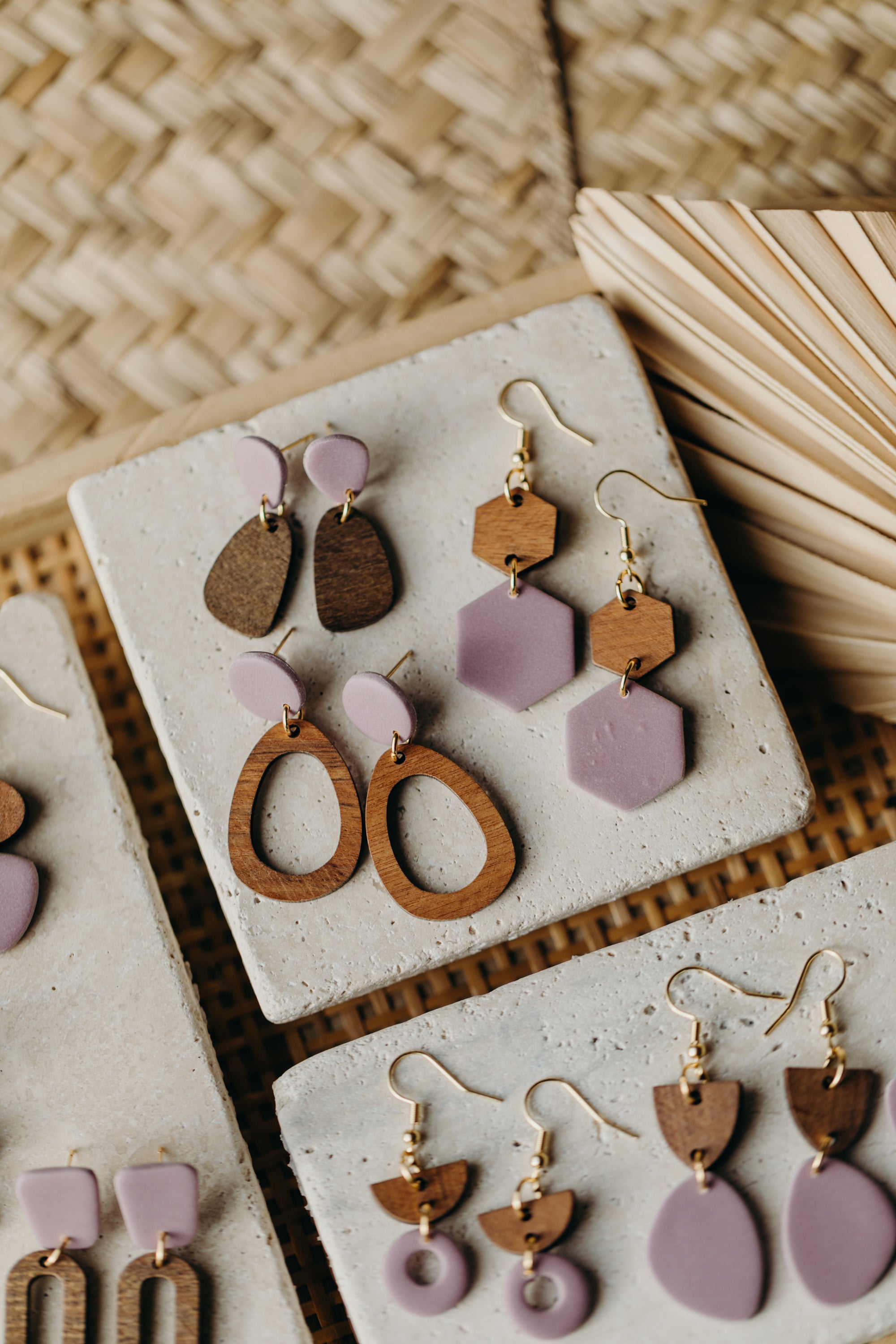 triangular polymer clay earrings in eucalyptus green with rectangular wooden pendant