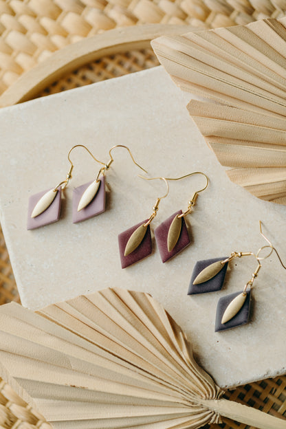 diamond-shaped polymer clay earrings in berry tones