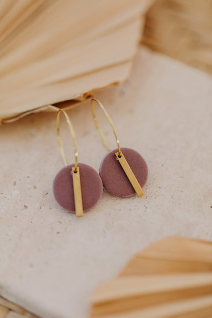 Hoop earrings with round polymer clay pendant and leaf