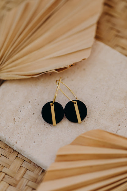 Hoop earrings with round polymer clay pendant and leaf