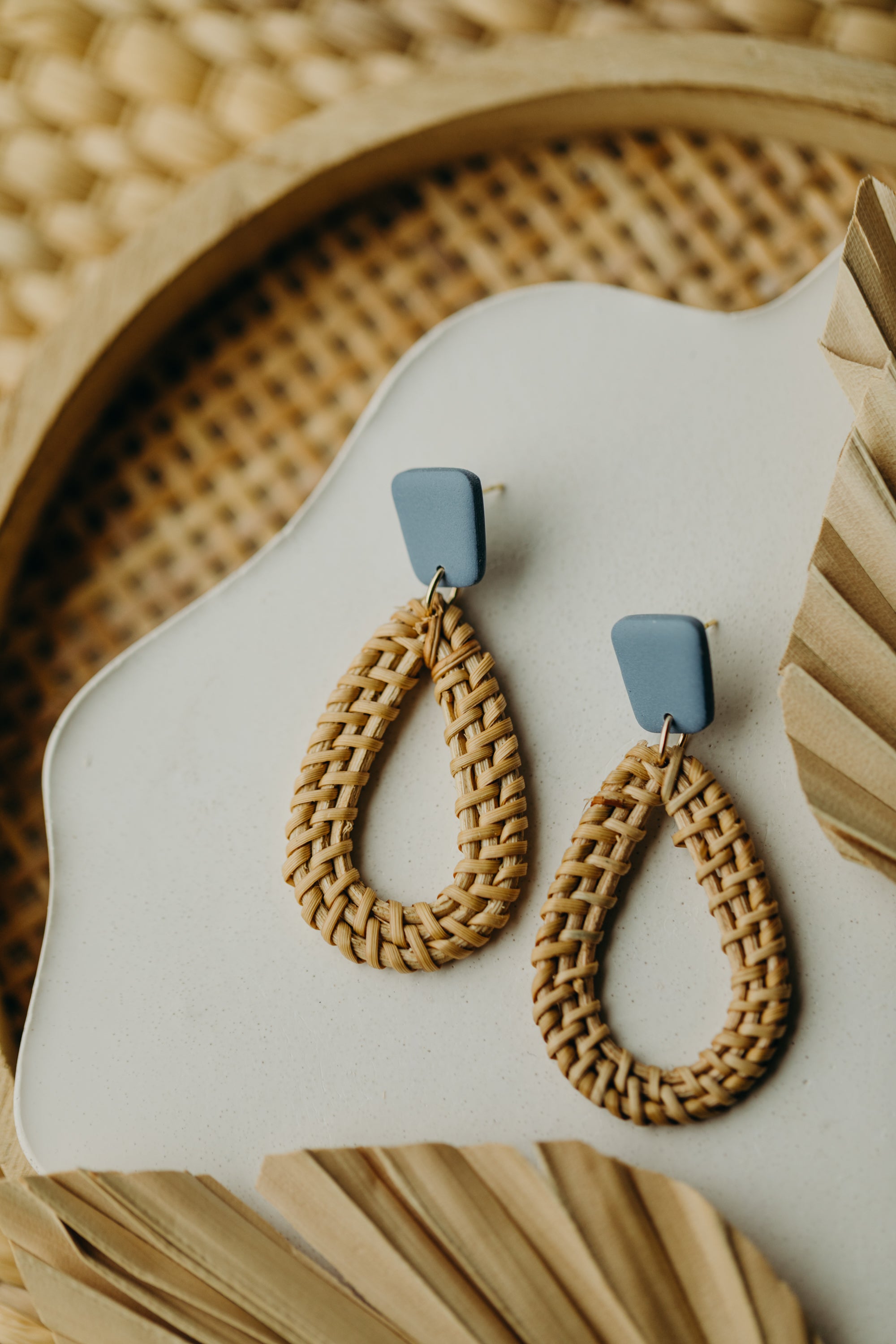 blue polymer clay earrings with rattan pendant drops