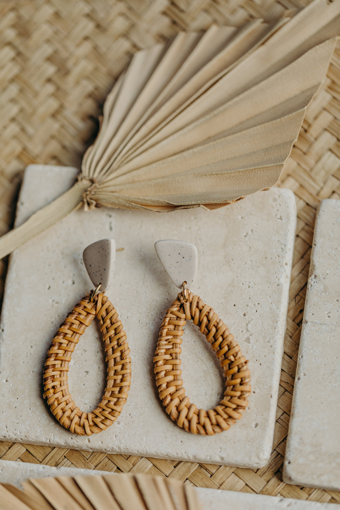 blue polymer clay earrings with rattan pendant drops