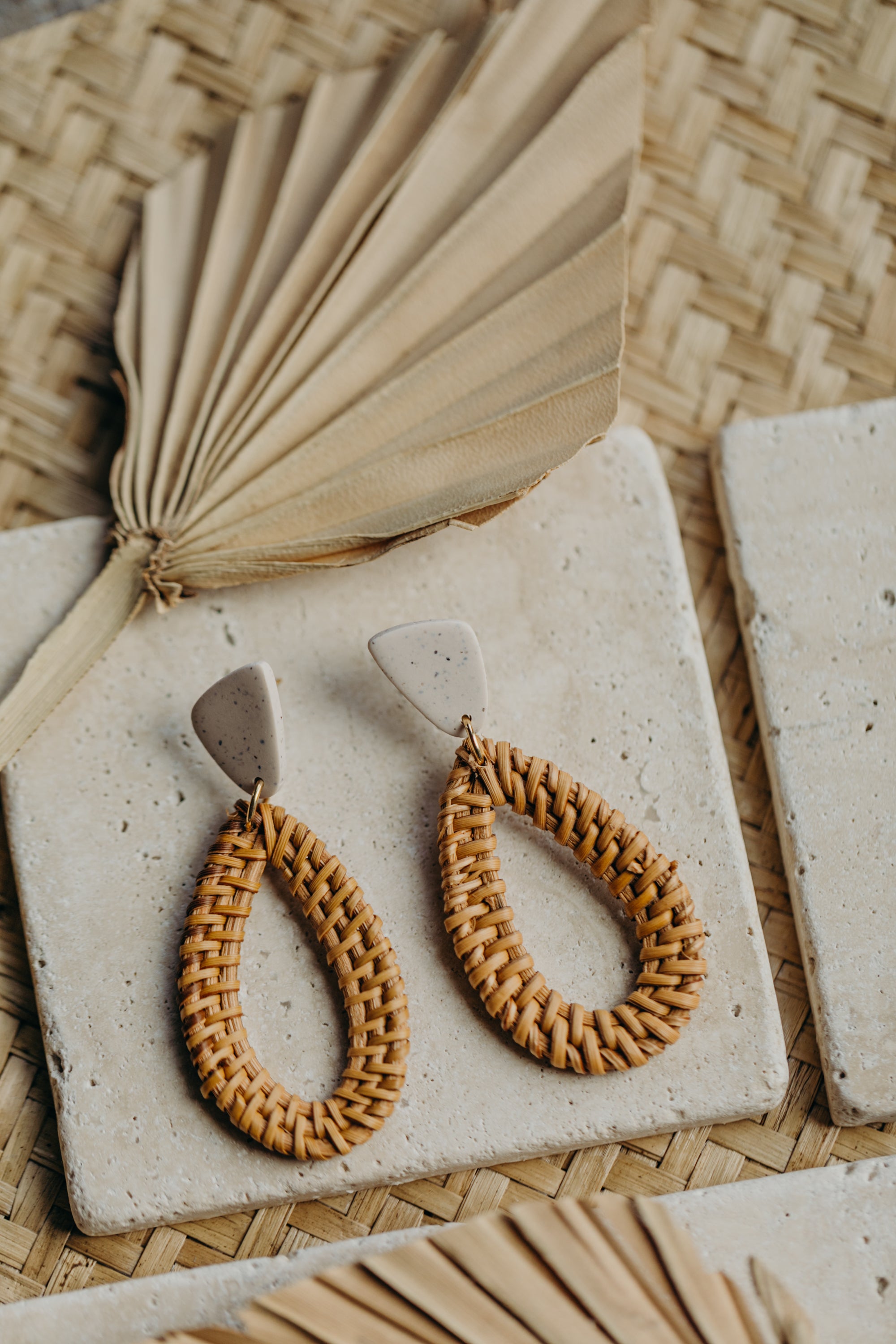 blue polymer clay earrings with rattan pendant drops