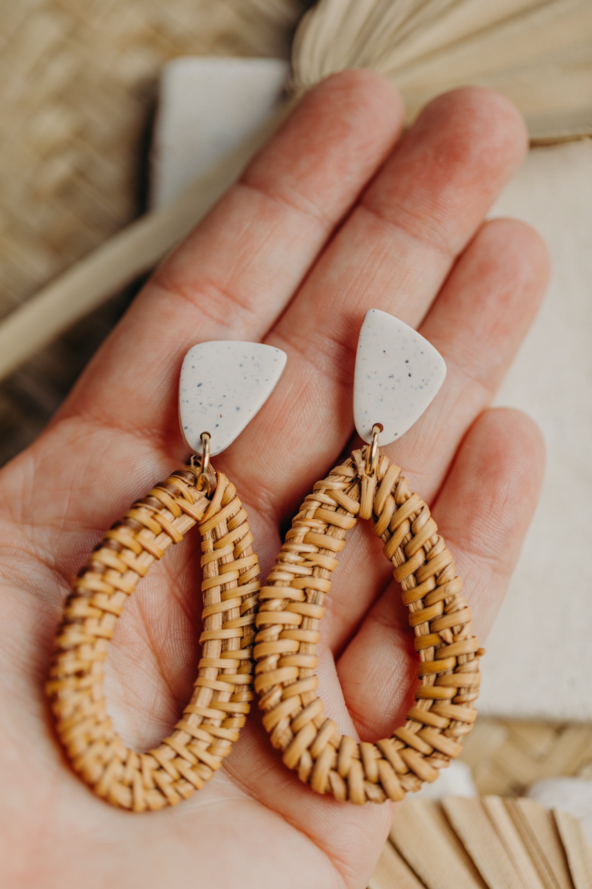 blue polymer clay earrings with rattan pendant drops