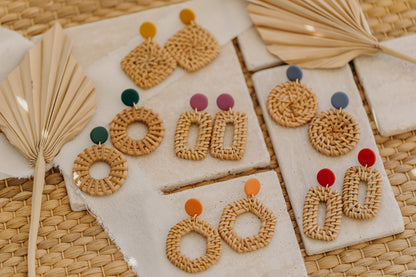 blue polymer clay earrings with round rattan pendant