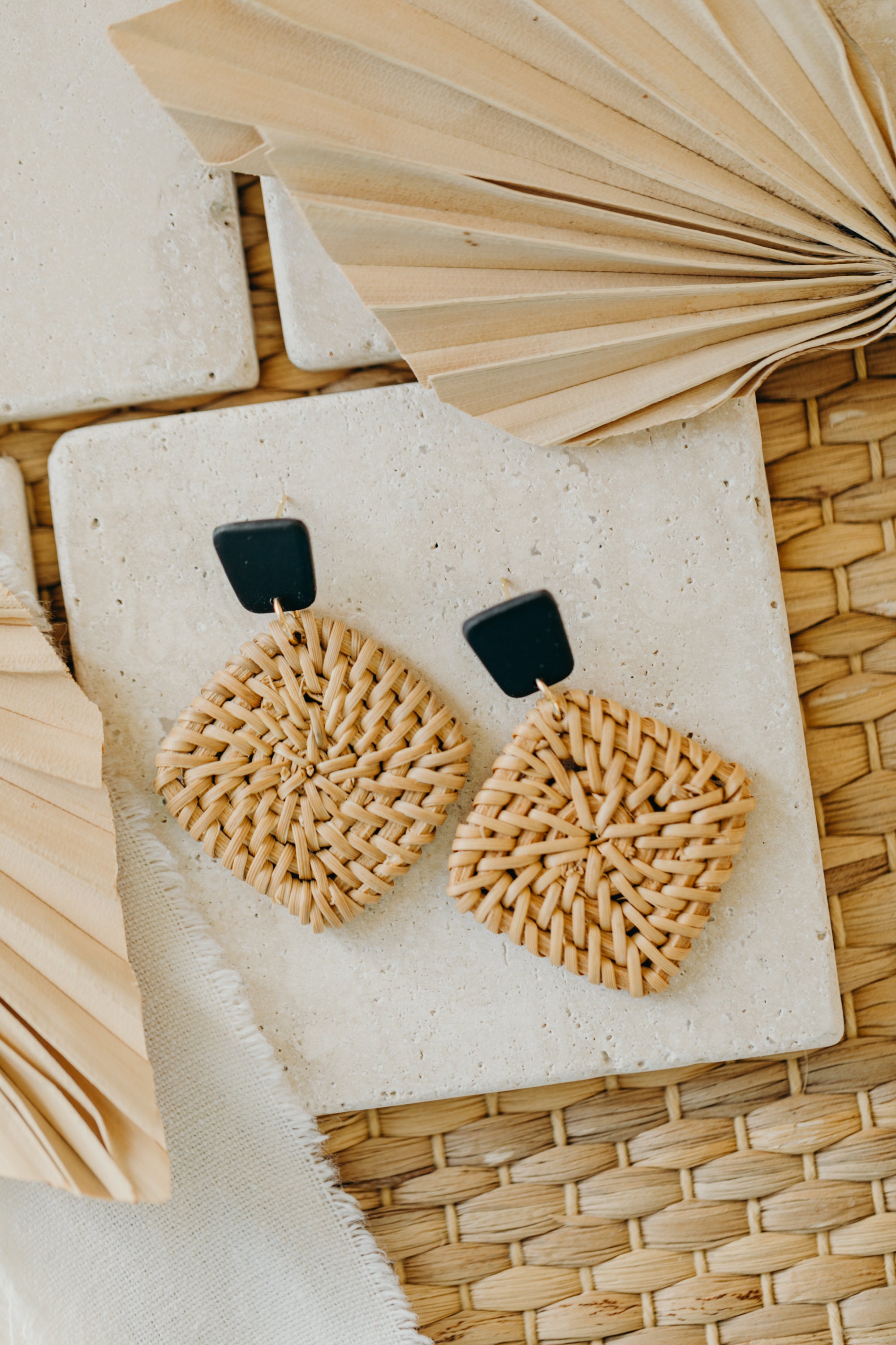 square polymer clay earrings in black with rattan pendant square