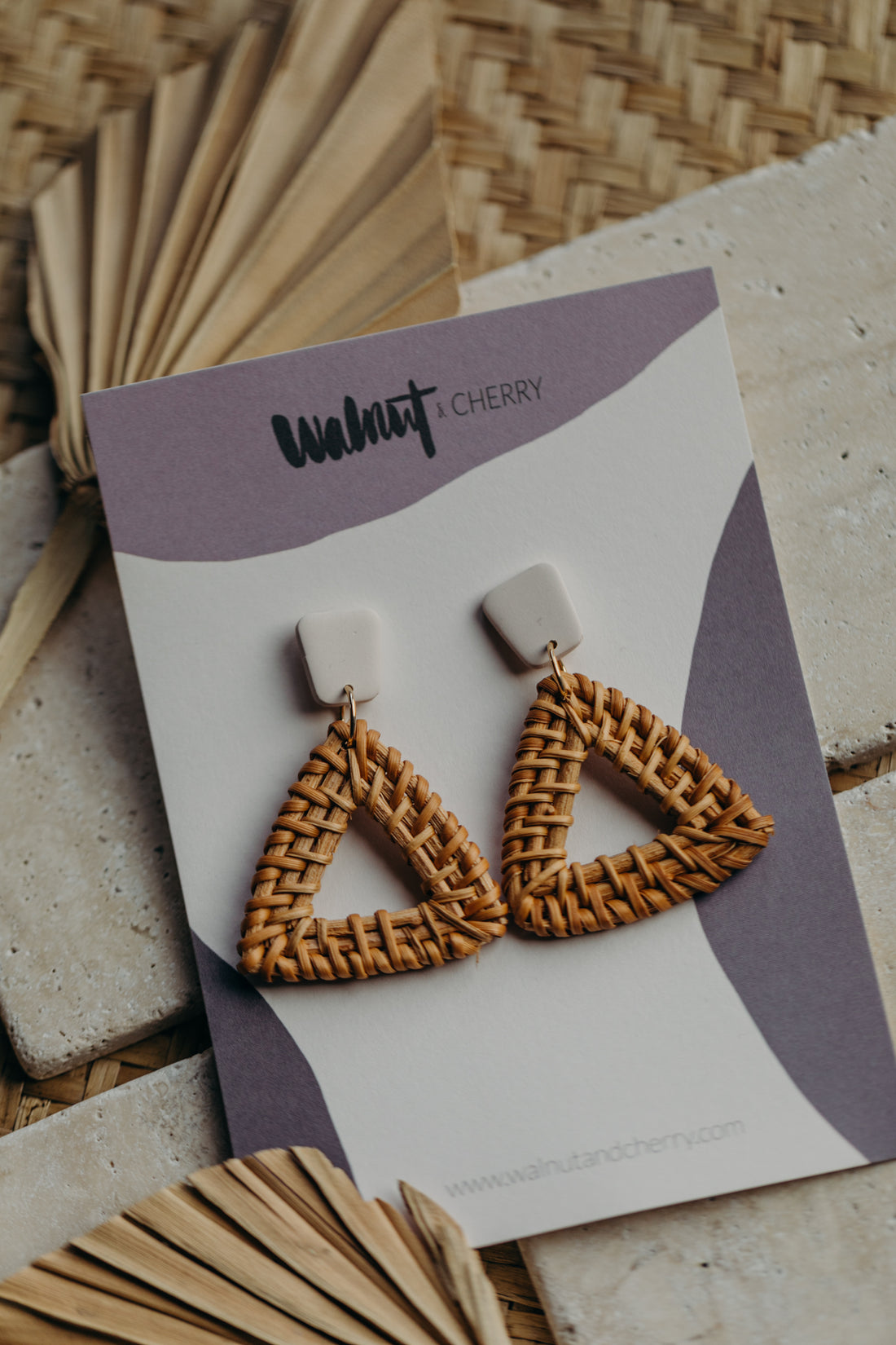 triangular polymer clay earrings in the color Barolo with rattan pendant triangle