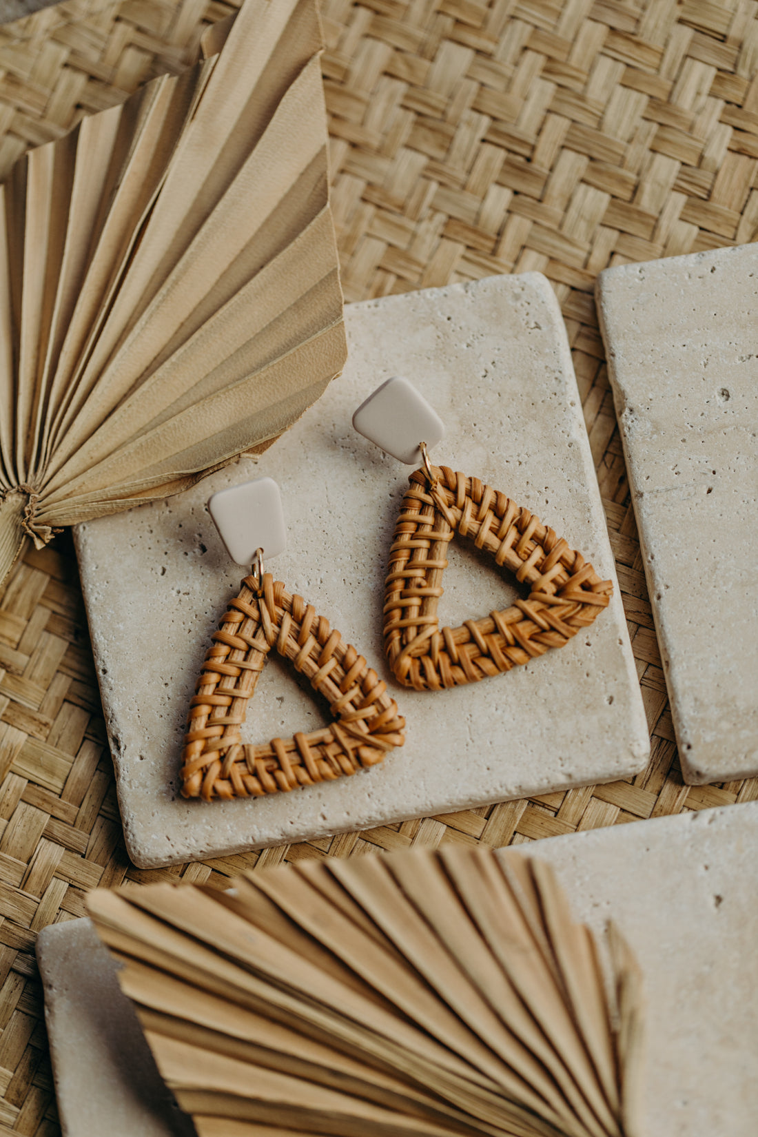 triangular polymer clay earrings in the color Barolo with rattan pendant triangle