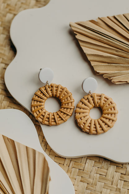 round polymer clay earrings in brown with rattan pendant circle