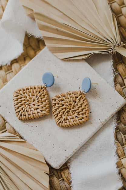 round polymer clay earrings in blue with rattan pendant square