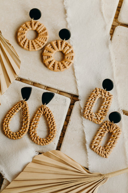 round polymer clay earrings in black with rattan pendant circle