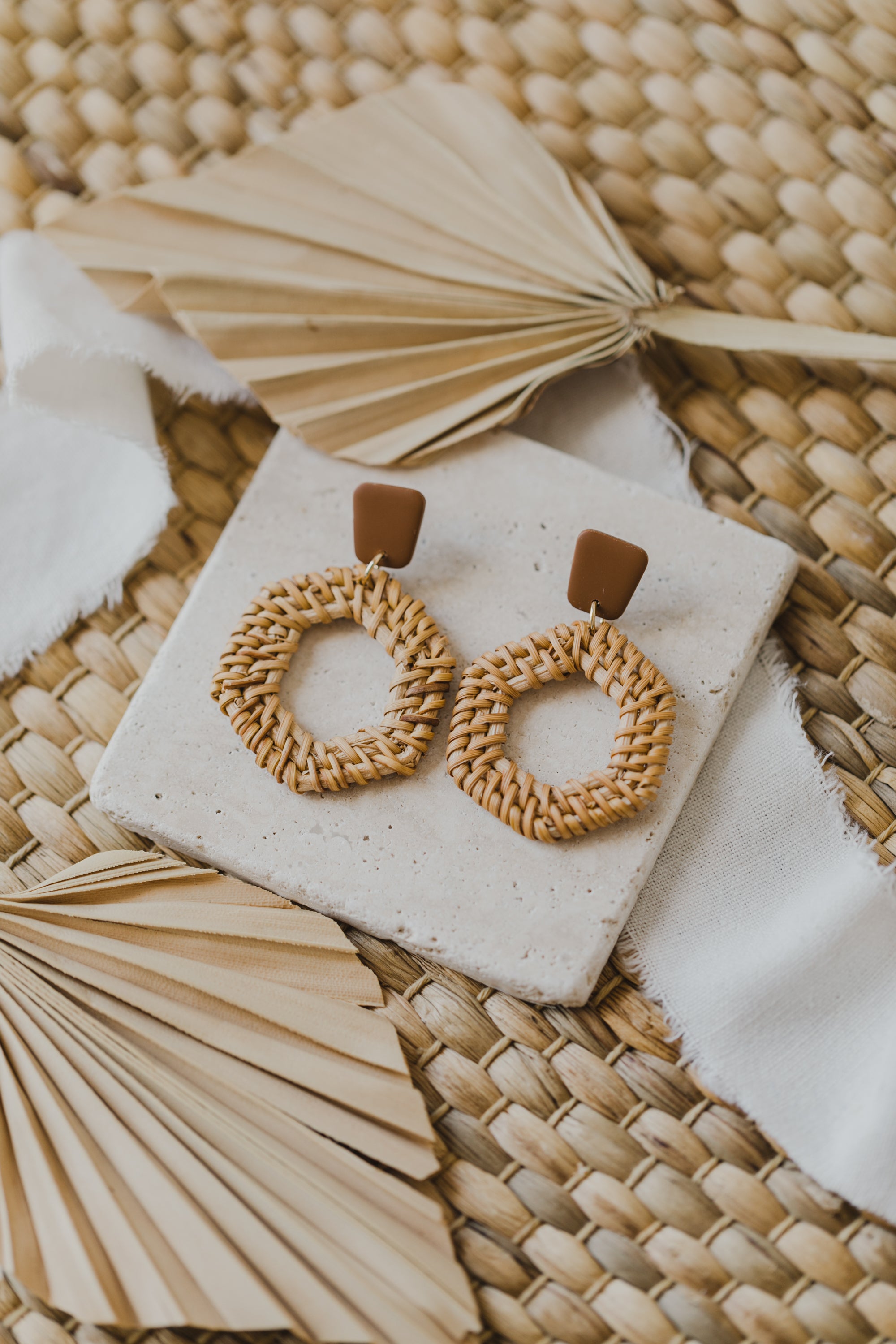 square polymer clay earrings in brown with rattan pendant hexagon