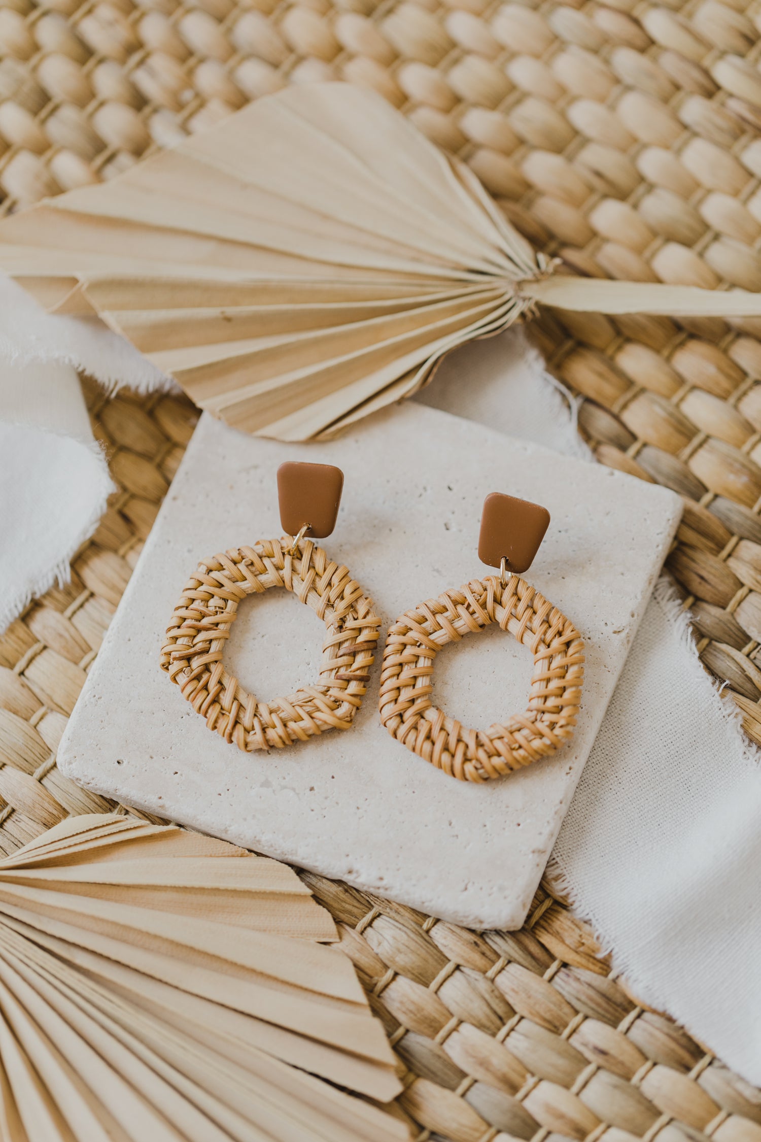 square polymer clay earrings in brown with rattan pendant hexagon