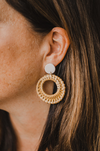 round polymer clay earrings in the color light pink with rattan pendant circle