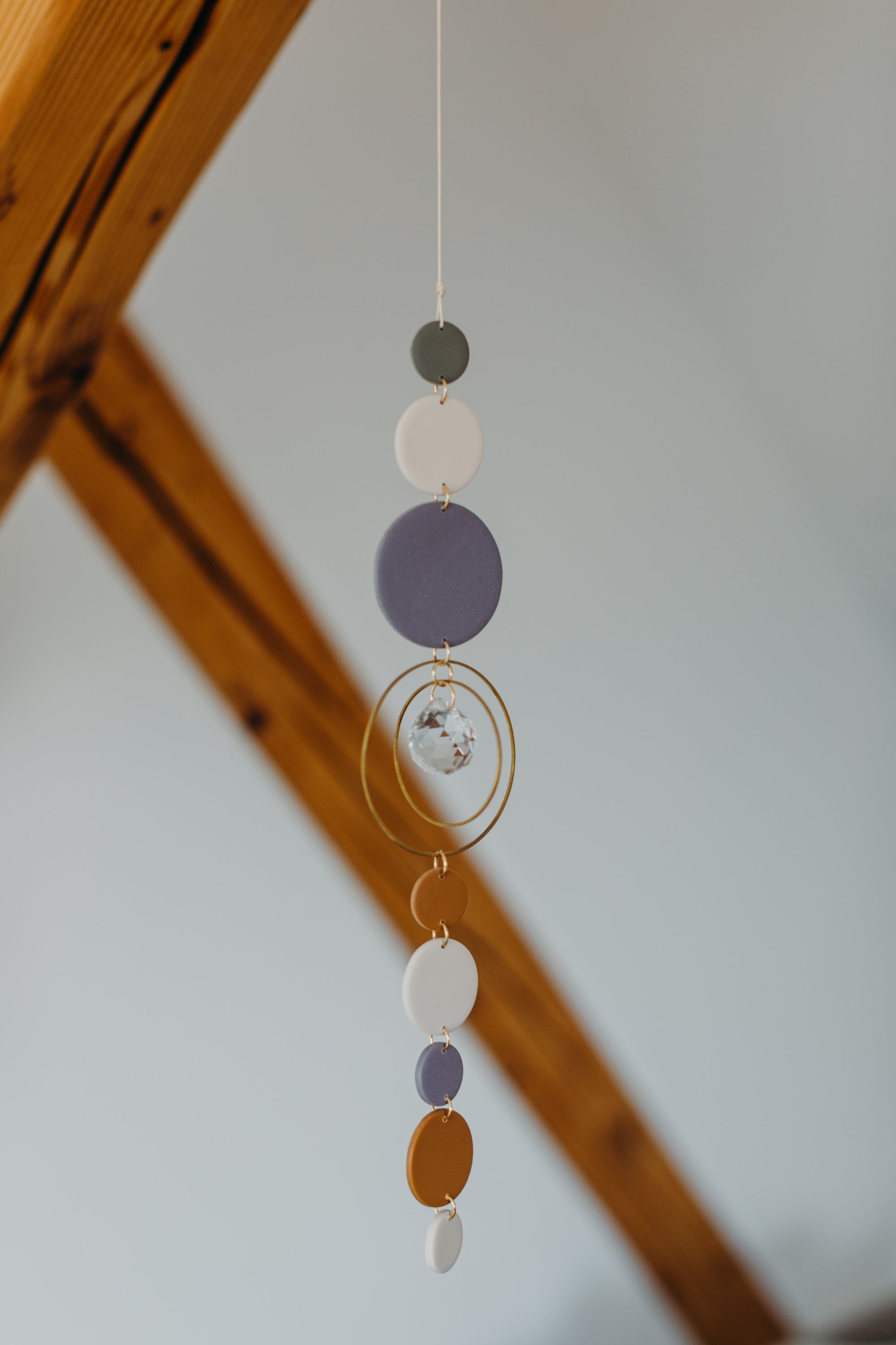 Suncatcher with dots cream, purple, brown and green 