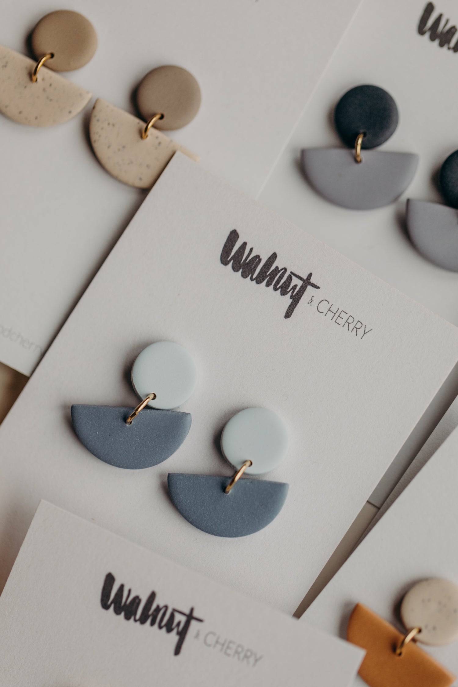 Tamara - two-tone polymer clay earrings in Barolo and dark blue