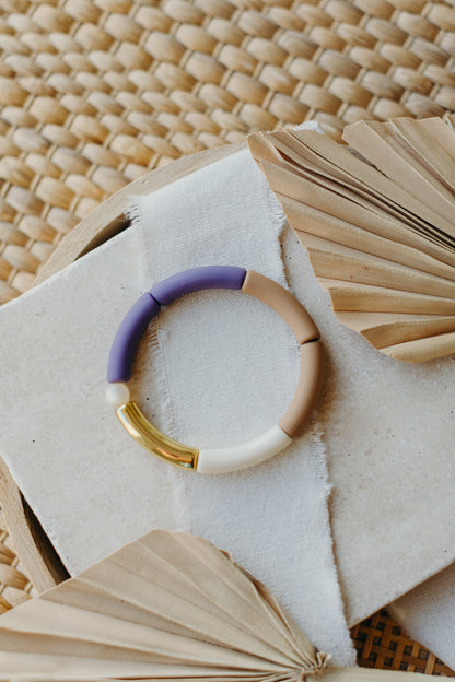 Pearl bracelet with tube pearls in gold, light brown, purple and white