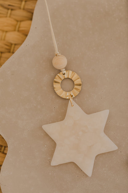 Christmas star pendant made of polymer clay