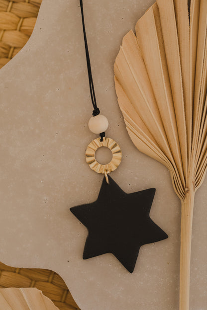 Christmas star pendant made of polymer clay