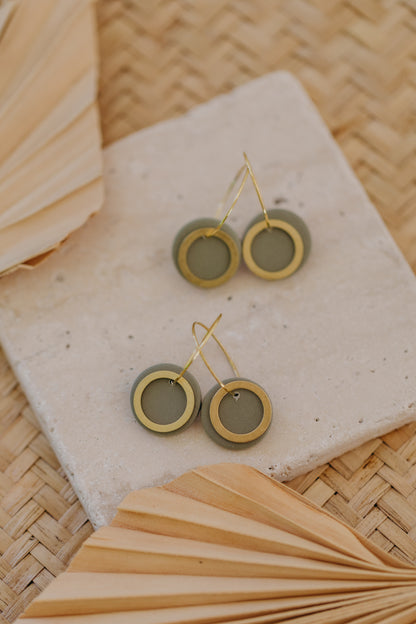 Hoop earrings with round polymer clay pendant and leaf