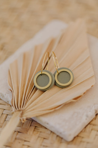 Hoop earrings with round polymer clay pendant and leaf