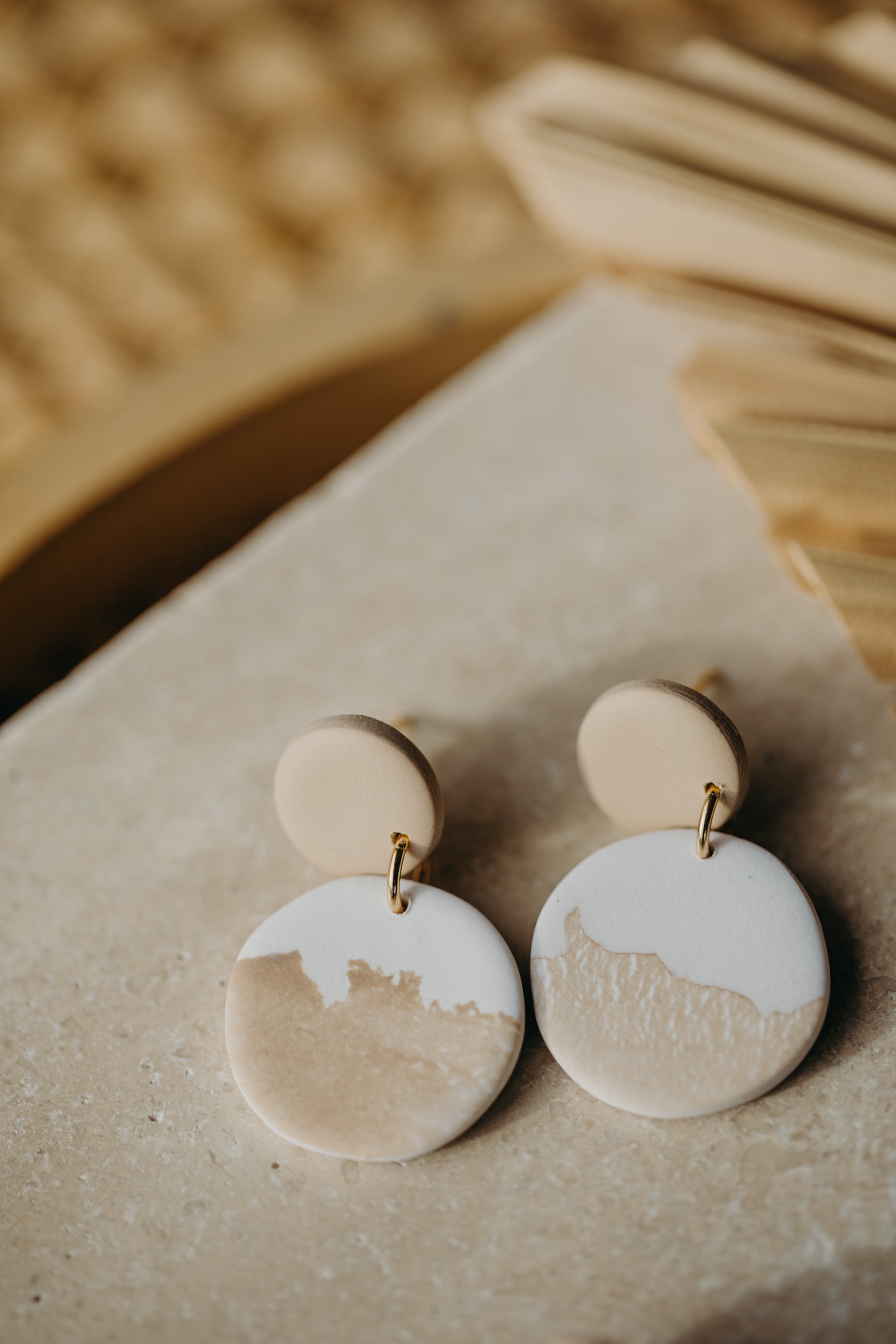 Hoop earrings with round polymer clay pendant and leaf