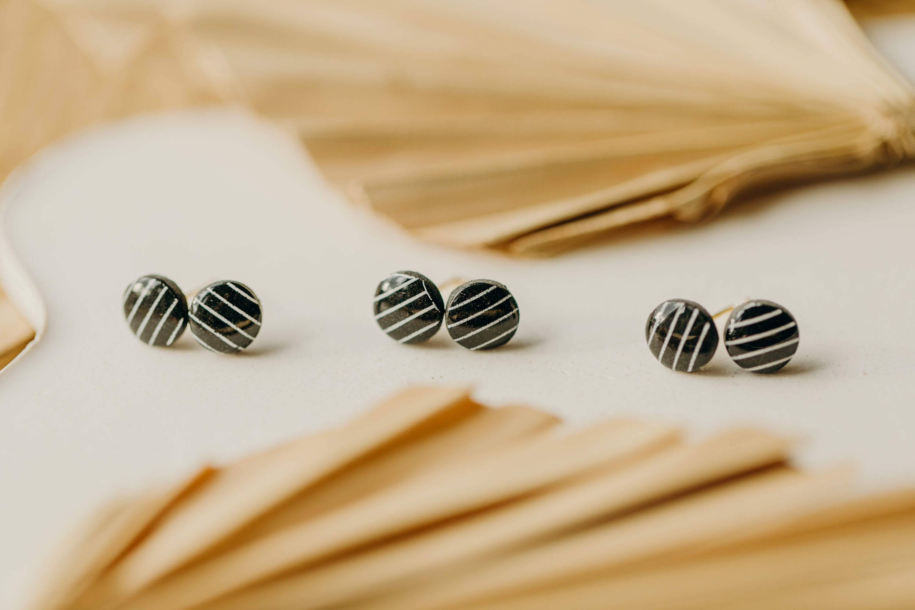 black and white striped polymer clay earrings